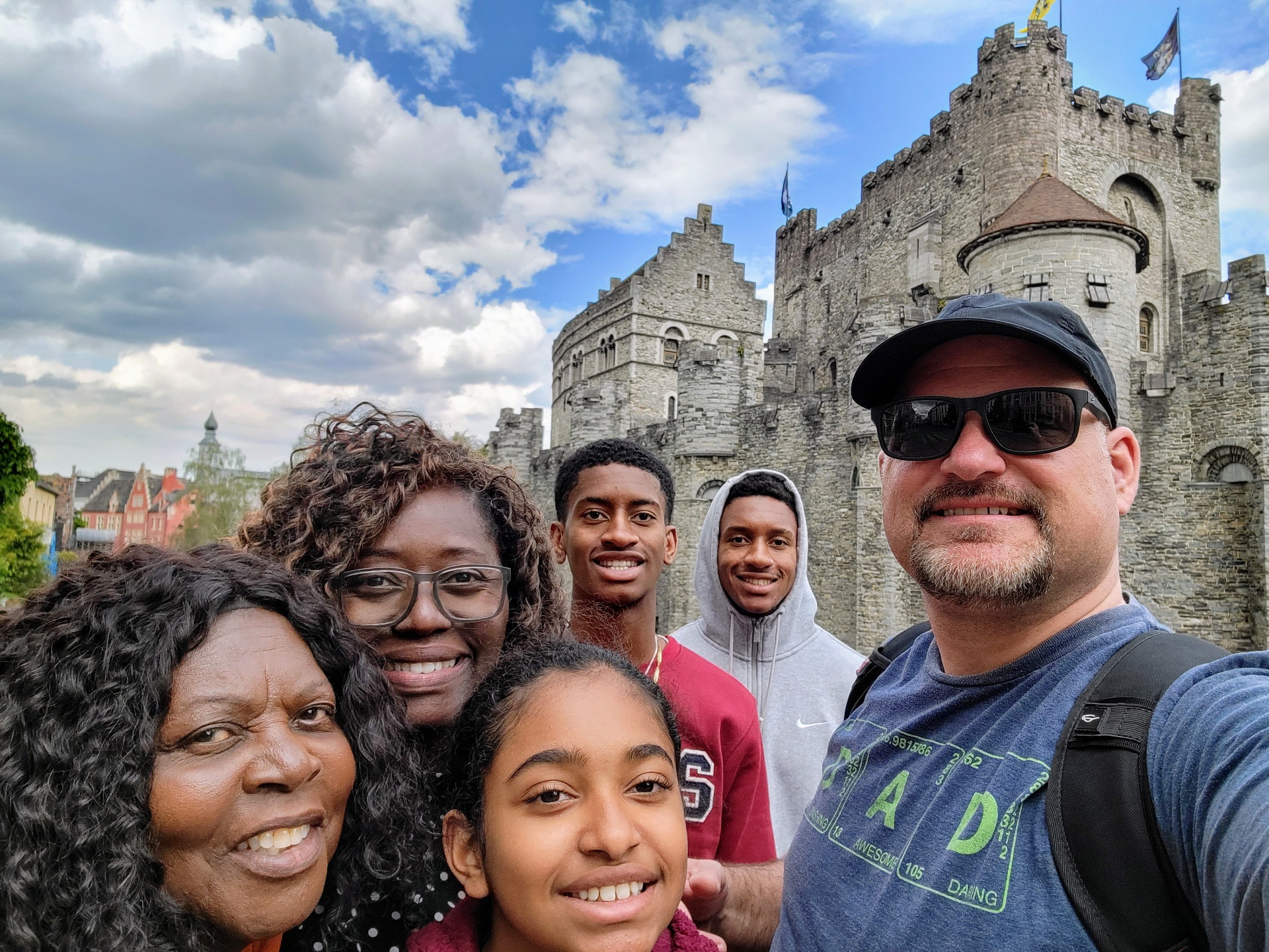 Tony's family enjoying a trip to a medieval castle in Belgium — the kind of complex multi-stop trip that benefits from an advisor's touch