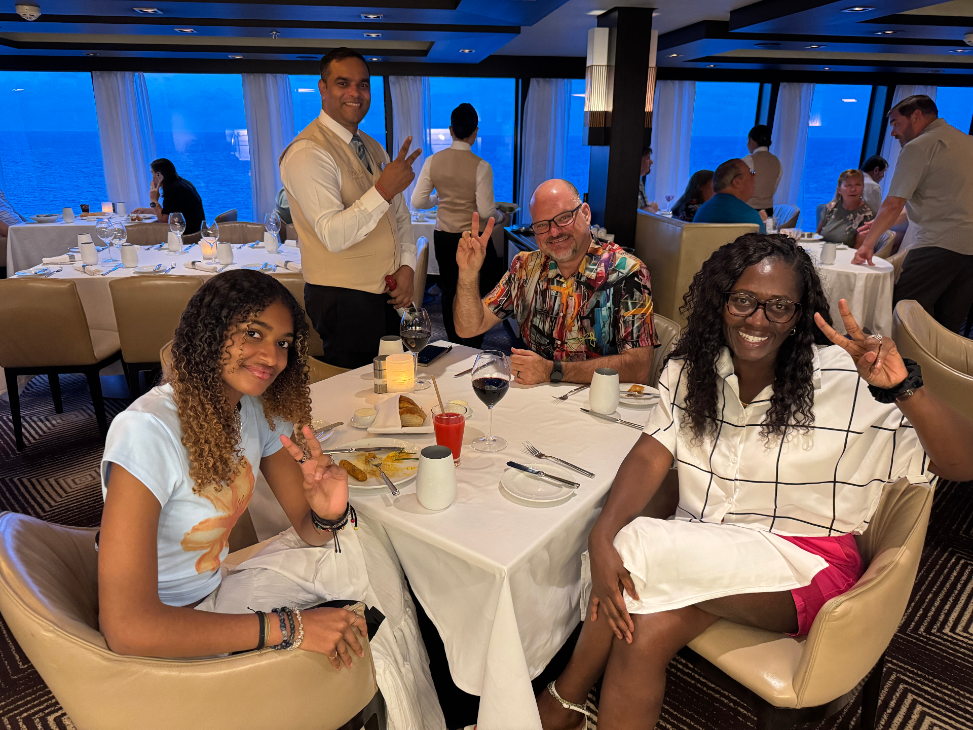 Peace signs at cruise dinner