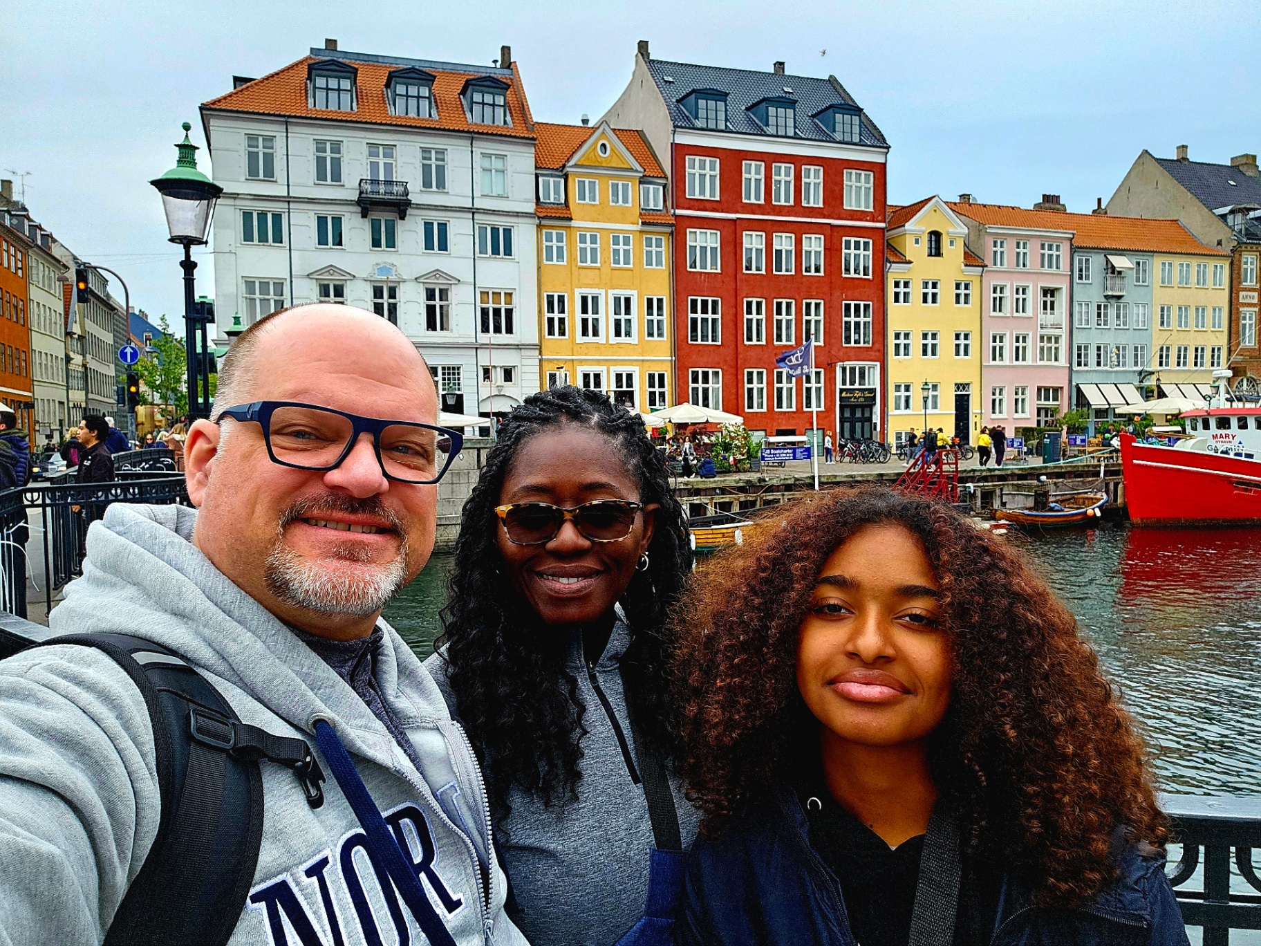 The Pagan family exploring Copenhagen in layered outfits — smart packing in action