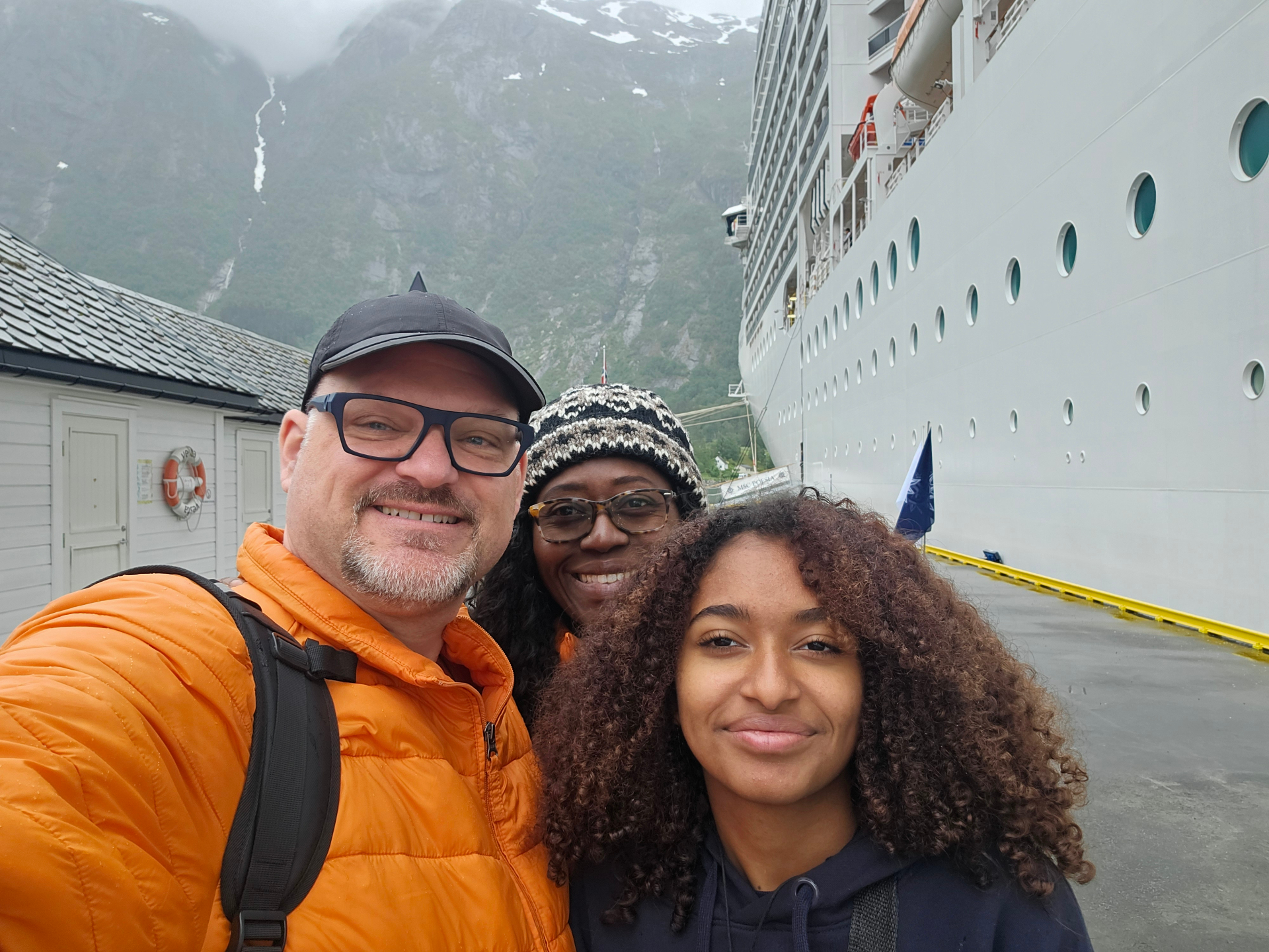 Tony and family in front of a cruise ship in Norway