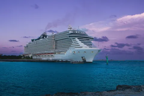 Cruise ship at sunset — cruise planning tips and mistakes to avoid