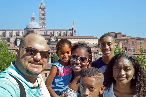 Family exploring Siena Italy — family travel planning guide