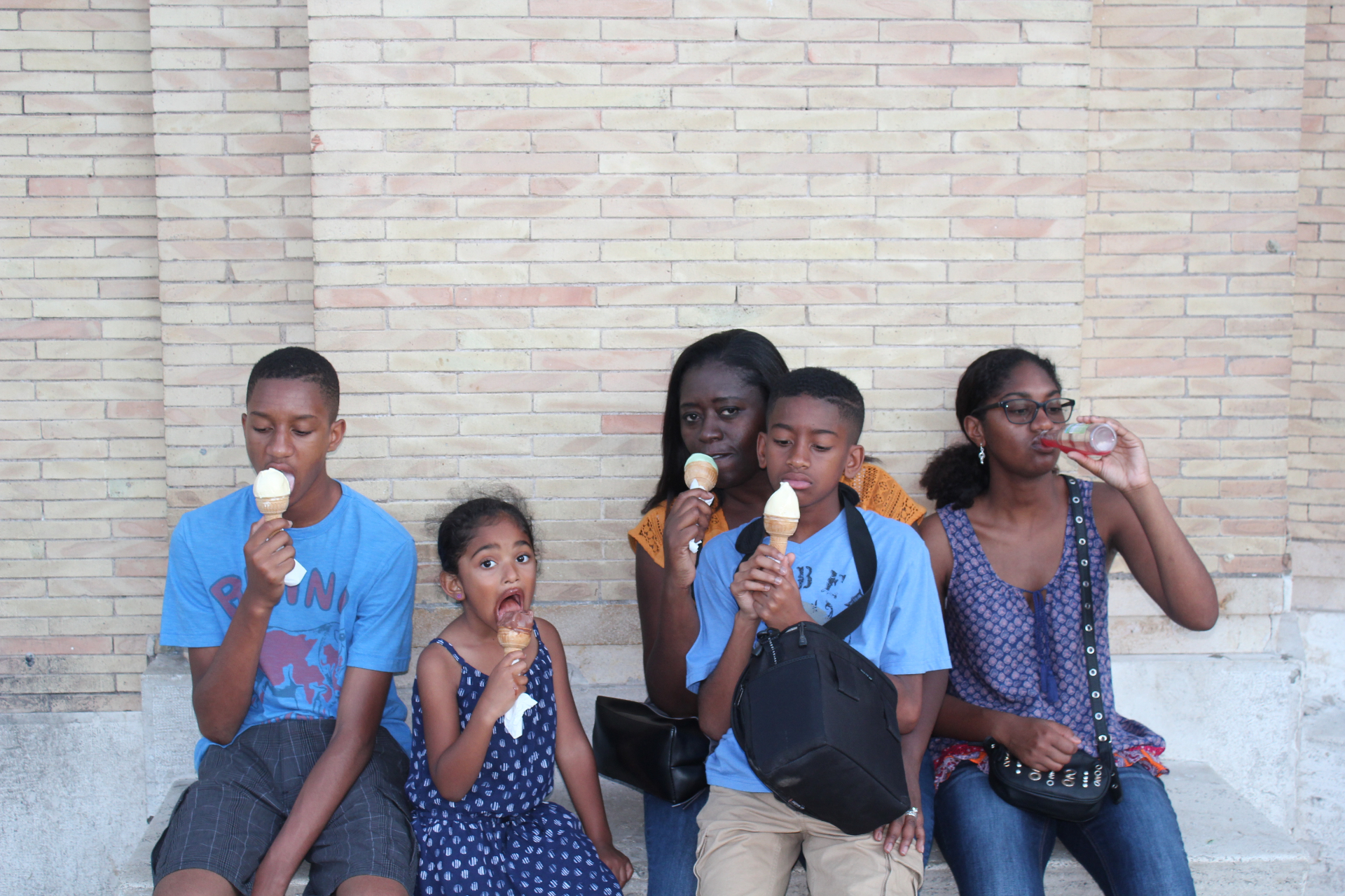 Tony's kids enjoying gelato on the streets of Italy — the best travel tradition