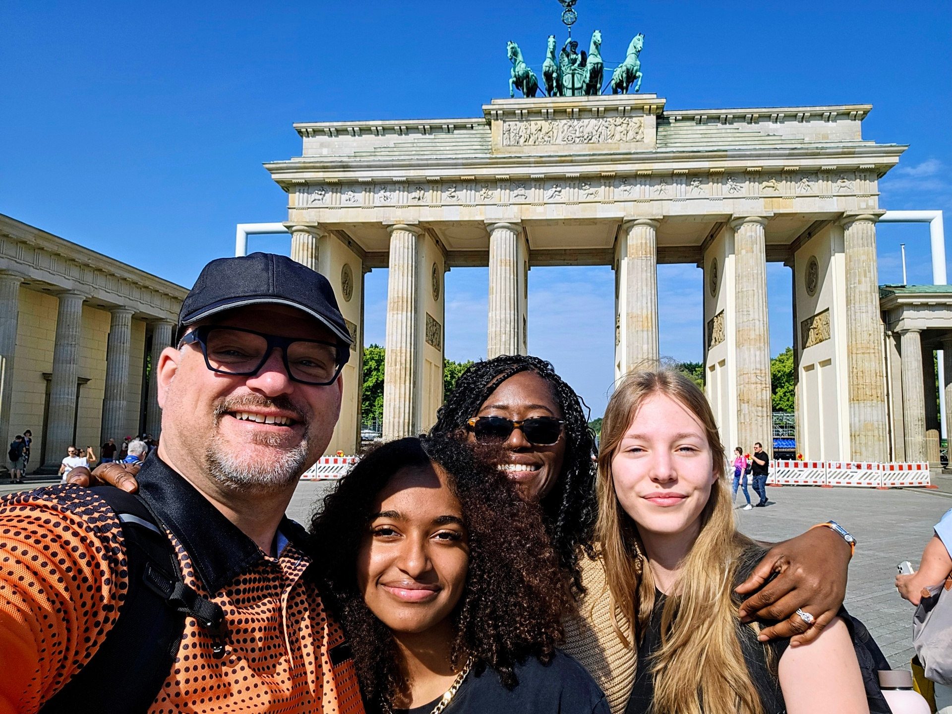 Family selfie at Brandenburg Gate in Berlin