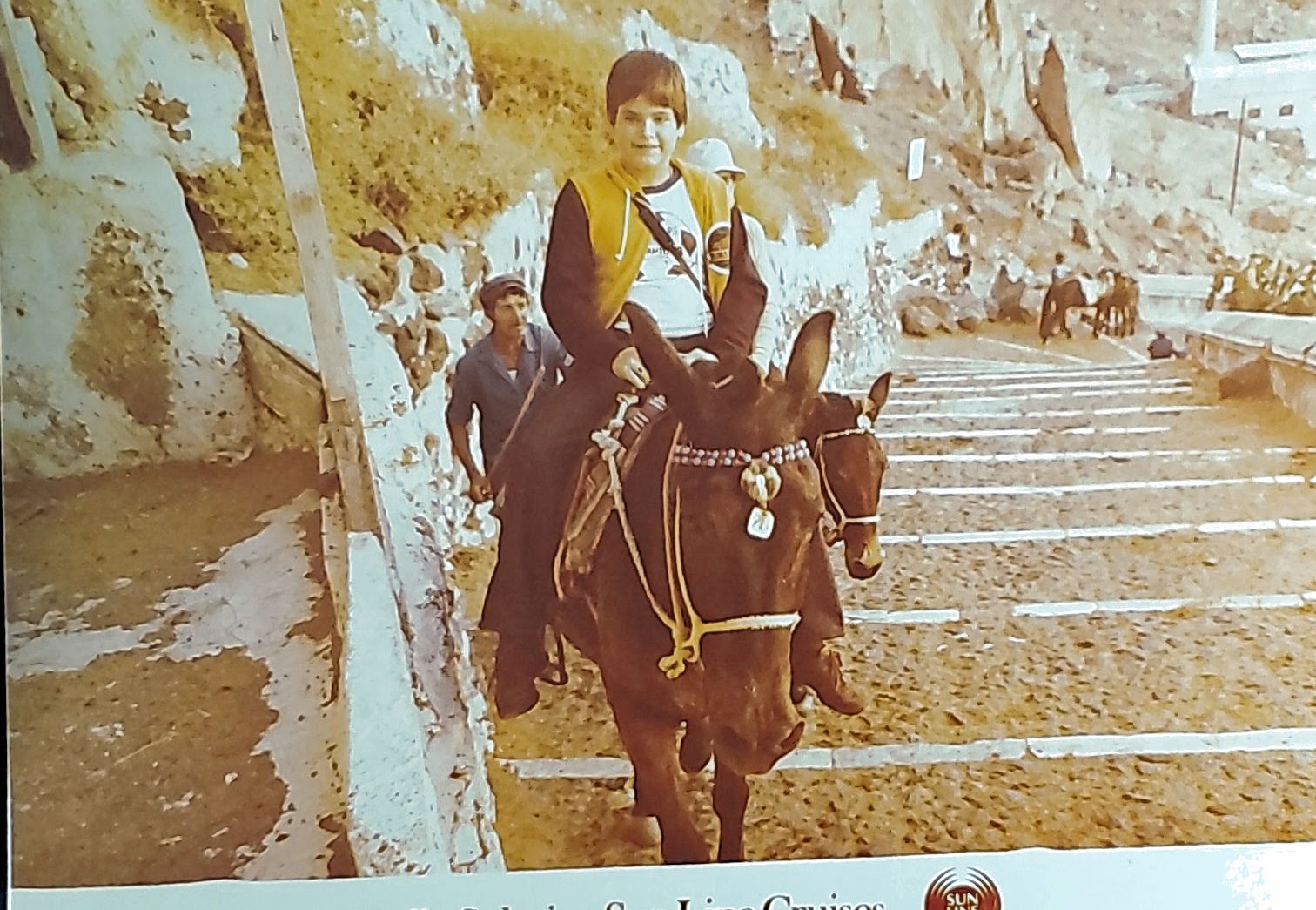 Young Tony riding a donkey in Greece