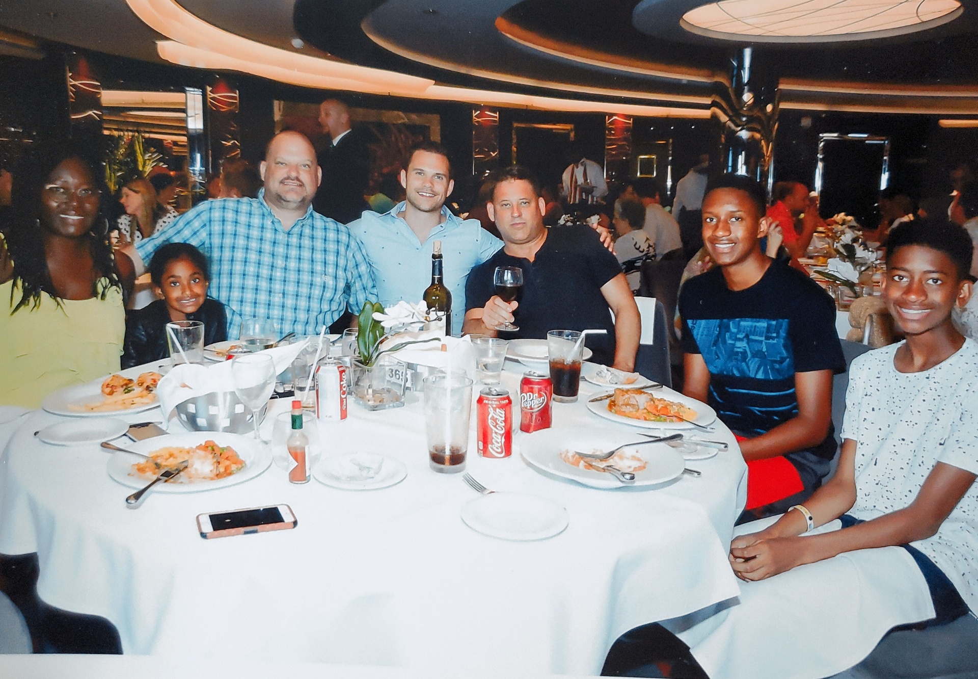 Large family dinner gathering on cruise