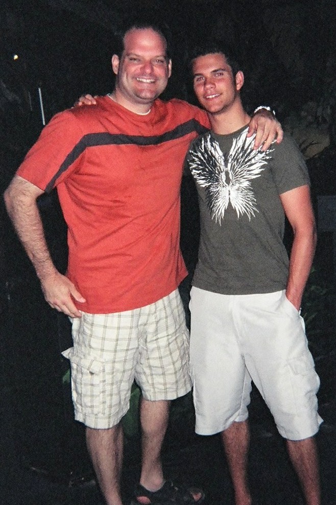 Tony and son on a tropical vacation