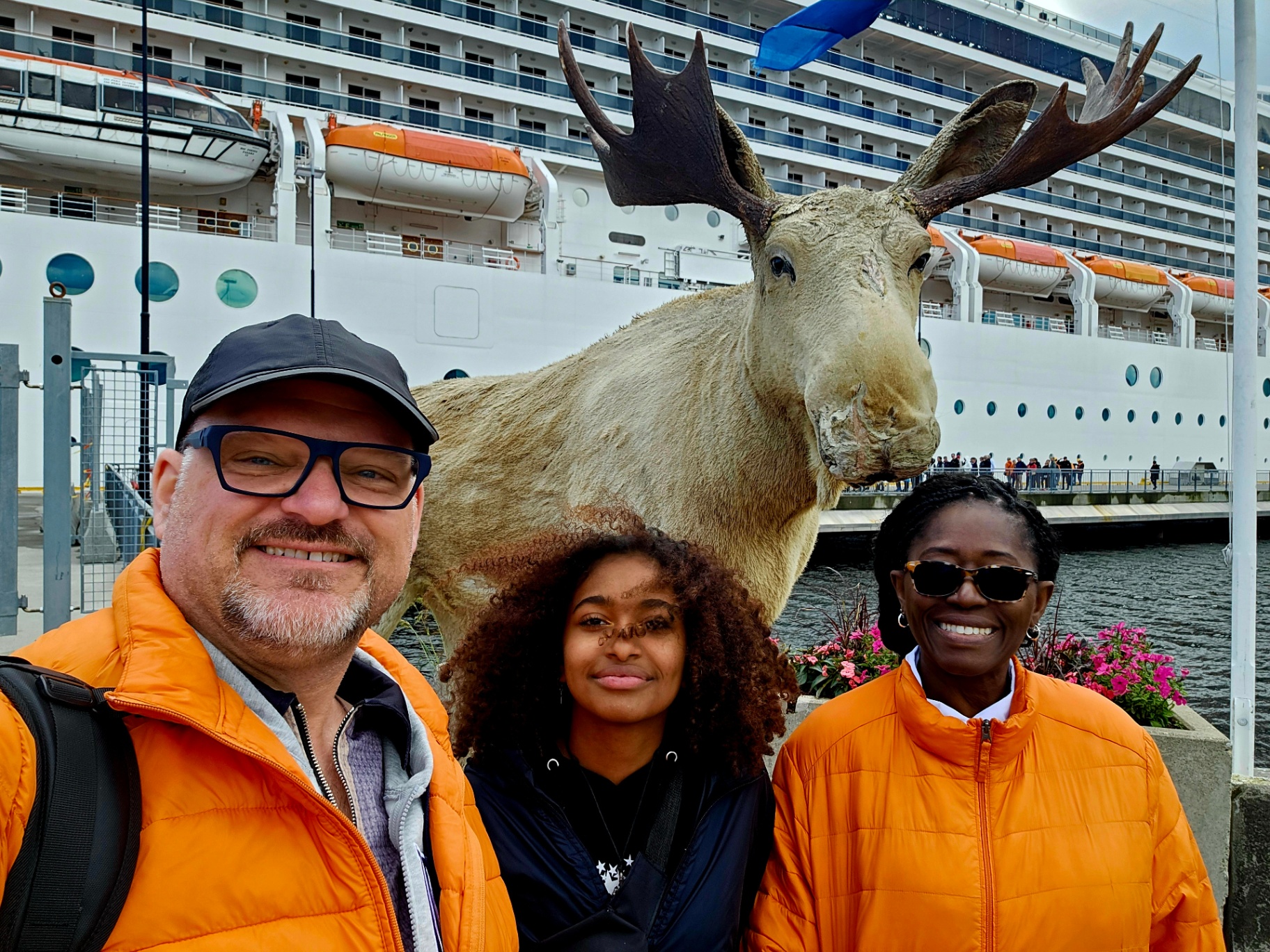 Posing with a moose statue by the cruise ship